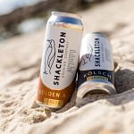 Shackleton Craft beer cans on the beach